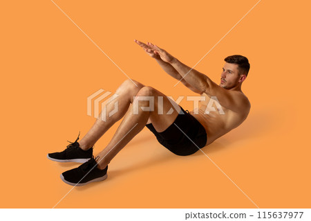 A man is seen doing an exercise against a vibrant orange background. He is focused and engaged in his workout routine, displaying strength and determination. A man is seen doing an exercise against a vibrant orange background. He is focused and engaged in his workout routine, displaying strength and determination. 115637977