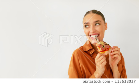 Happy woman eating slice of tasty italian pizza and looking back at free space for mockup advertisement on white studio wall background, banner panorama Happy woman eating slice of tasty italian pizza and looking back at free space for mockup advertisement on white studio wall background, banner panorama 115638037