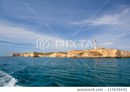 coastal ledge with lighthouse 115638430