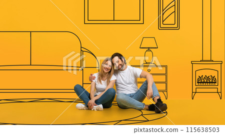 Positive millennial caucasian couple hug on floor, dreams of own home, isolated on orange background studio, with abstract drawn furniture in living room interior. Design planning, buy house 115638503