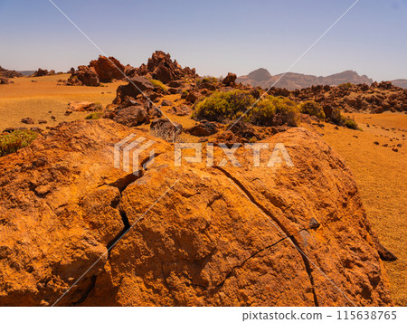 spot in Tenerife with many red rocks and beautiful mountain landscape background spot in Tenerife with many red rocks and beautiful mountain landscape background 115638765