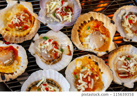 grilled scallops with cheese on the grill grilled scallops with cheese on the grill 115639358