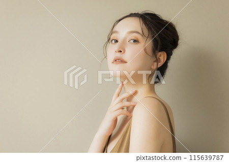 Young woman beauty image beige background Young woman beauty image beige background 115639787