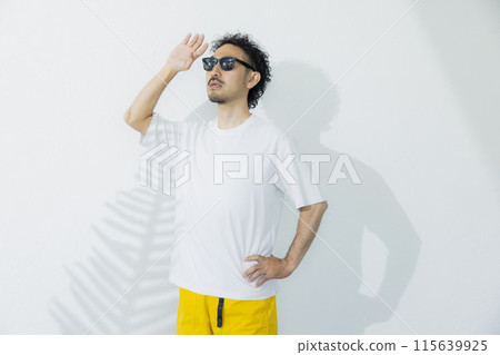 Man wearing sunglasses Man wearing sunglasses 115639925