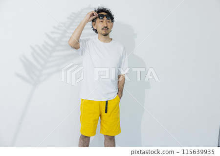 Man wearing sunglasses Man wearing sunglasses 115639935