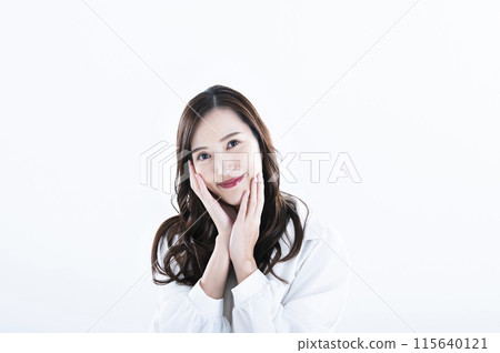 Woman smiling portrait white background long hair 115640121