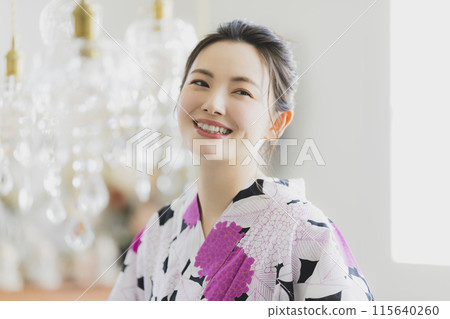A woman in a yukata A woman in a yukata 115640260