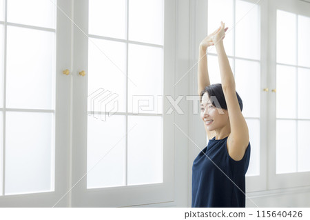 Middle-aged woman doing body care 115640426