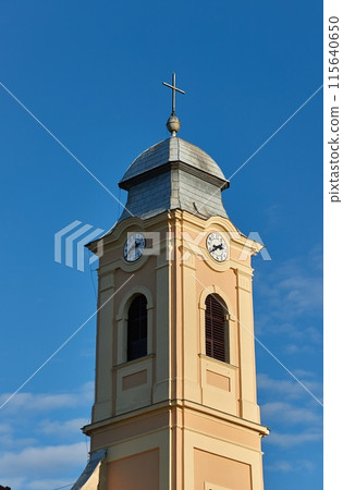 Old church tower renovated 115640650