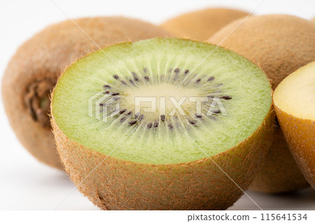 Close-up background of green kiwi and gold kiwi 115641534
