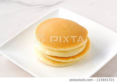 Fluffy and delicious pancakes Fluffy and delicious pancakes 115641723
