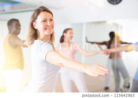Adult woman learning dance in dance studio Adult woman learning dance in dance studio 115642983