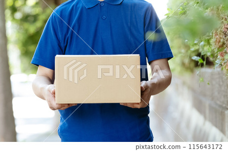 Delivery man male with baggage Delivery man male with baggage 115643172