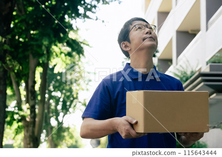 Male carrying baggage 115643444