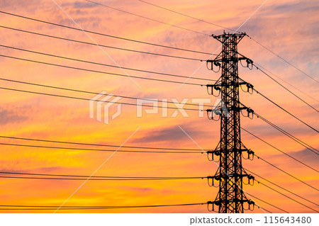 A row of power transmission towers and a sunset sky with thin clouds e-2 Cool colors, high contrast A row of power transmission towers and a sunset sky with thin clouds e-2 Cool colors, high contrast 115643480