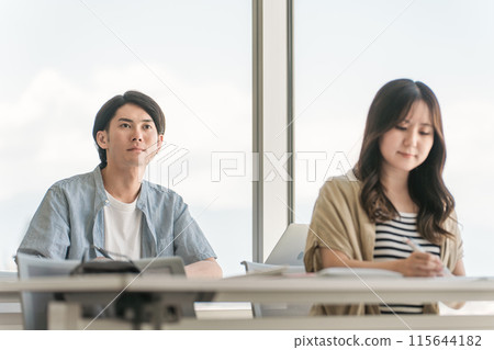 Male and female university students and businessmen attending lectures, classes and seminars at universities and schools Male and female university students and businessmen attending lectures, classes and seminars at universities and schools 115644182