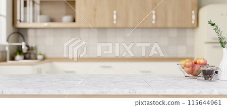 A copy space on a white marble kitchen tabletop in a contemporary minimalist kitchen. A copy space on a white marble kitchen tabletop in a contemporary minimalist kitchen. 115644961