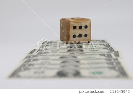 Road from dollar bills and homemade dice isolated on white background, unpredictability of financial Road from dollar bills and homemade dice isolated on white background, unpredictability of financial 115645943