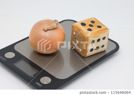 Beautiful strong white onion heads on an electronic kitchen scale. Healthy food, diet. 115646064