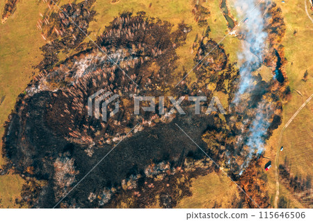 Concept Of Save Nature. Nature In Danger. Wild Open Fire Destroys Grass. Natural Disaster. Aerial View Of Dry Grass Burns During Drought And Hot Weather. Bush Fire And Smoke In Meadow Field 115646506