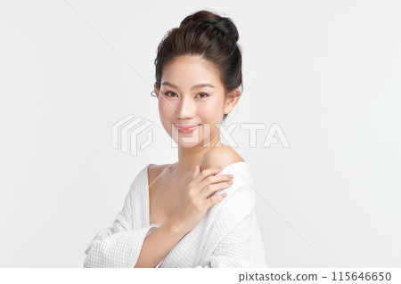 Beautiful young asian woman with clean fresh skin on white background, Face care, Facial treatment, Cosmetology, beauty and spa, Asian women portrait. Beautiful young asian woman with clean fresh skin on white background, Face care, Facial treatment, Cosmetology, beauty and spa, Asian women portrait. 115646650