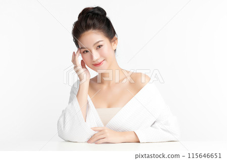 Beautiful young asian woman with clean fresh skin on white background, Face care, Facial treatment, Cosmetology, beauty and spa, Asian women portrait. Beautiful young asian woman with clean fresh skin on white background, Face care, Facial treatment, Cosmetology, beauty and spa, Asian women portrait. 115646651