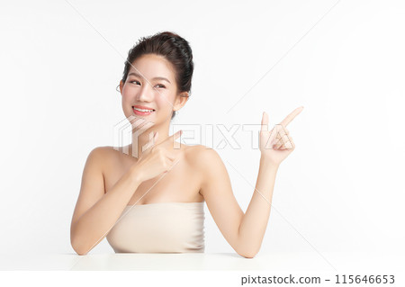 Beautiful young asian woman with clean fresh skin on white background, Face care, Facial treatment, Cosmetology, beauty and spa, Asian women portrait. Beautiful young asian woman with clean fresh skin on white background, Face care, Facial treatment, Cosmetology, beauty and spa, Asian women portrait. 115646653