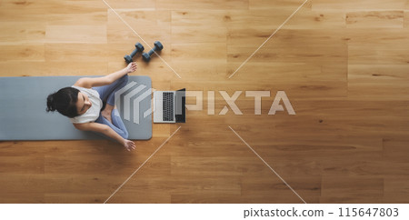 High angle view of young Asian woman practicing yoga and meditation at home 115647803