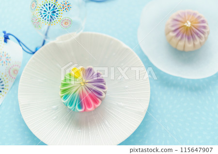 Seasonal Japanese sweets "Hanabi" and wind chimes Seasonal Japanese sweets "Hanabi" and wind chimes 115647907