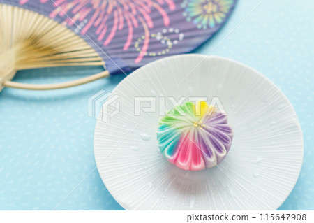 Seasonal Japanese sweets "Hanabi" and a fan 115647908