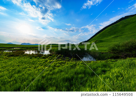Evening scenery of the Soni Plateau on the border between Nara and Mie prefectures: the gentle slopes of Mount Kuruson and Okame Pond Evening scenery of the Soni Plateau on the border between Nara and Mie prefectures: the gentle slopes of Mount Kuruson and Okame Pond 115649508