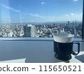 Taking a break from the skyscrapers with a cup of coffee 115650521