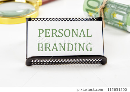 Business concept. Personal Branding text on a white card on a white background in a composition with EURO bills and a magnifying glass Business concept. Personal Branding text on a white card on a white background in a composition with EURO bills and a magnifying glass 115651200