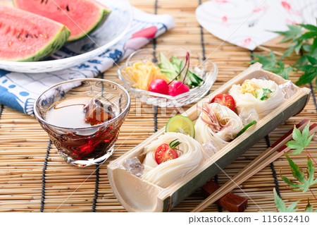 Somen noodles served on natural bamboo, a summer image Somen noodles served on natural bamboo, a summer image 115652410