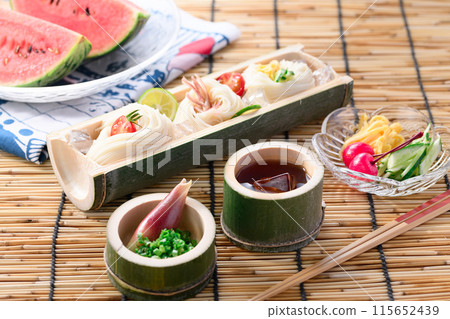 Somen noodles served on natural bamboo, a summer image Somen noodles served on natural bamboo, a summer image 115652439