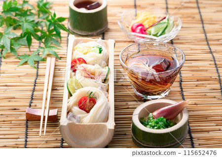 Somen noodles served on natural bamboo, a summer image Somen noodles served on natural bamboo, a summer image 115652476