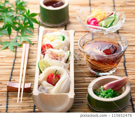 Somen noodles served on natural bamboo, a summer image Somen noodles served on natural bamboo, a summer image 115652478
