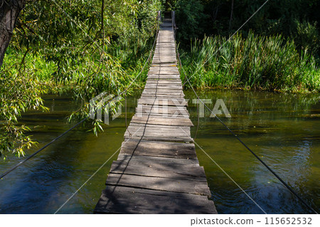 Suspension bridge, walkway to the adventurous, cross to the other side 115652532