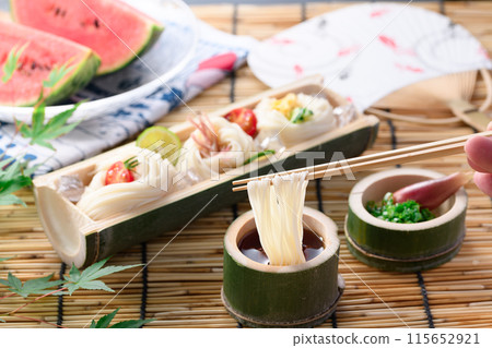 A summer tradition: dipping somen noodles in sauce 115652921