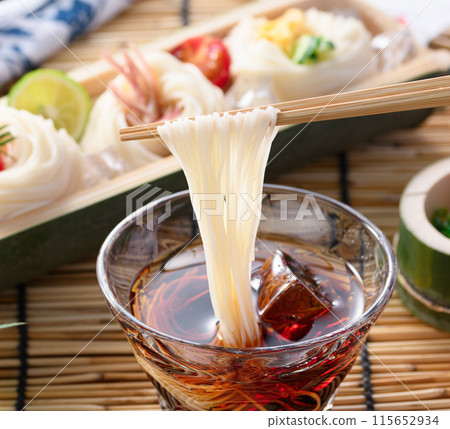 A summer tradition: dipping somen noodles in sauce A summer tradition: dipping somen noodles in sauce 115652934
