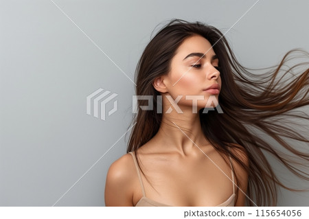Stunning Brazilian with hair flowing beautifully in a breeze 115654056