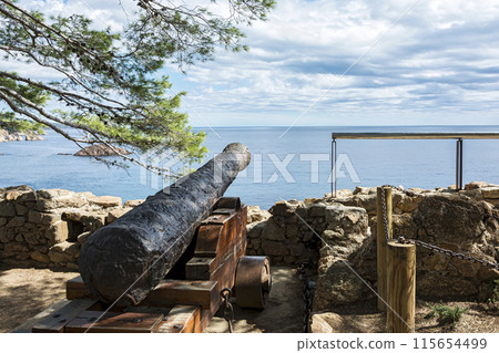 Old gun in the fortress of the old town (Tossa de Mar, Spain) 115654499