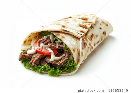 Simple beef shawarma with crisp lettuce, tomato, and onion on a clean white background 115655349