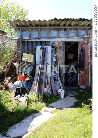 Shed with junk and building materials in the village, utility room 115655657