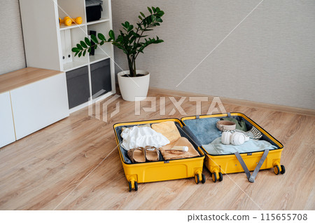 Packing suitcase for travel vacation in new normal, top view. 115655708