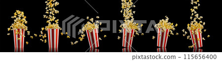 Paper striped bucket with popcorn isolated on black background 115656400
