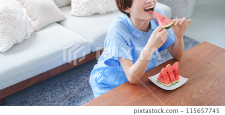Woman eating watermelon (summer, food) 115657745