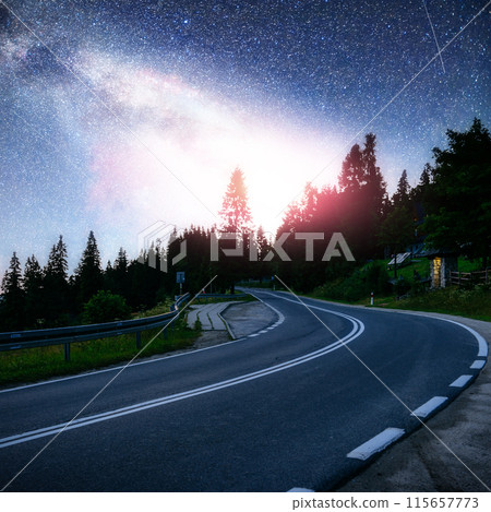 Asphalt road under a starry night sky and the Milky Way Asphalt road under a starry night sky and the Milky Way 115657773