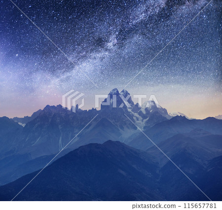 Fantastic starry sky. Snow-capped peaks. Main Caucasian Ridge. Mountain View from Mount Ushba Meyer, Georgia. Europe Fantastic starry sky. Snow-capped peaks. Main Caucasian Ridge. Mountain View from Mount Ushba Meyer, Georgia. Europe 115657781