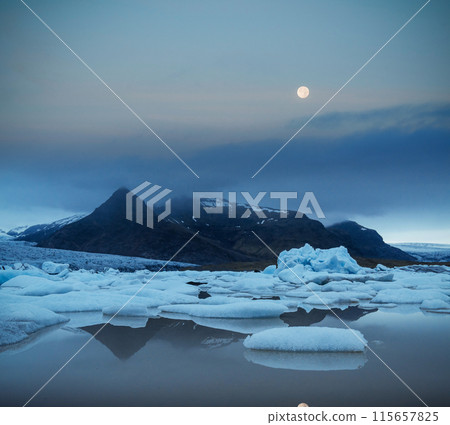 Famous Reynisdrangar rock formations at black Reynisfjara Beach. Coast of the Atlantic ocean near Vik, southern Iceland Famous Reynisdrangar rock formations at black Reynisfjara Beach. Coast of the Atlantic ocean near Vik, southern Iceland 115657825